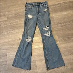 American Eagle Flare Jeans Size 6 Light Wash Distressed Hippie 70’s Rodeo Fringe